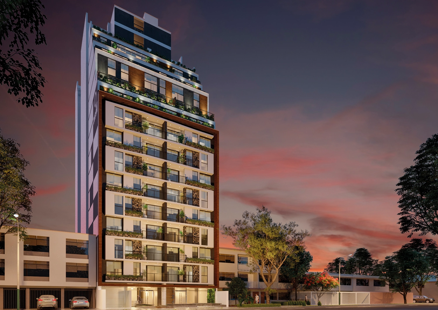 Fachada nocturna iluminada del proyecto SUMA. Proyecto exclusivo de diseño moderno de 16 pisos, cerca de San Isidro.